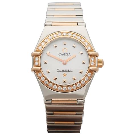 omega constellation diamond bezel watch.